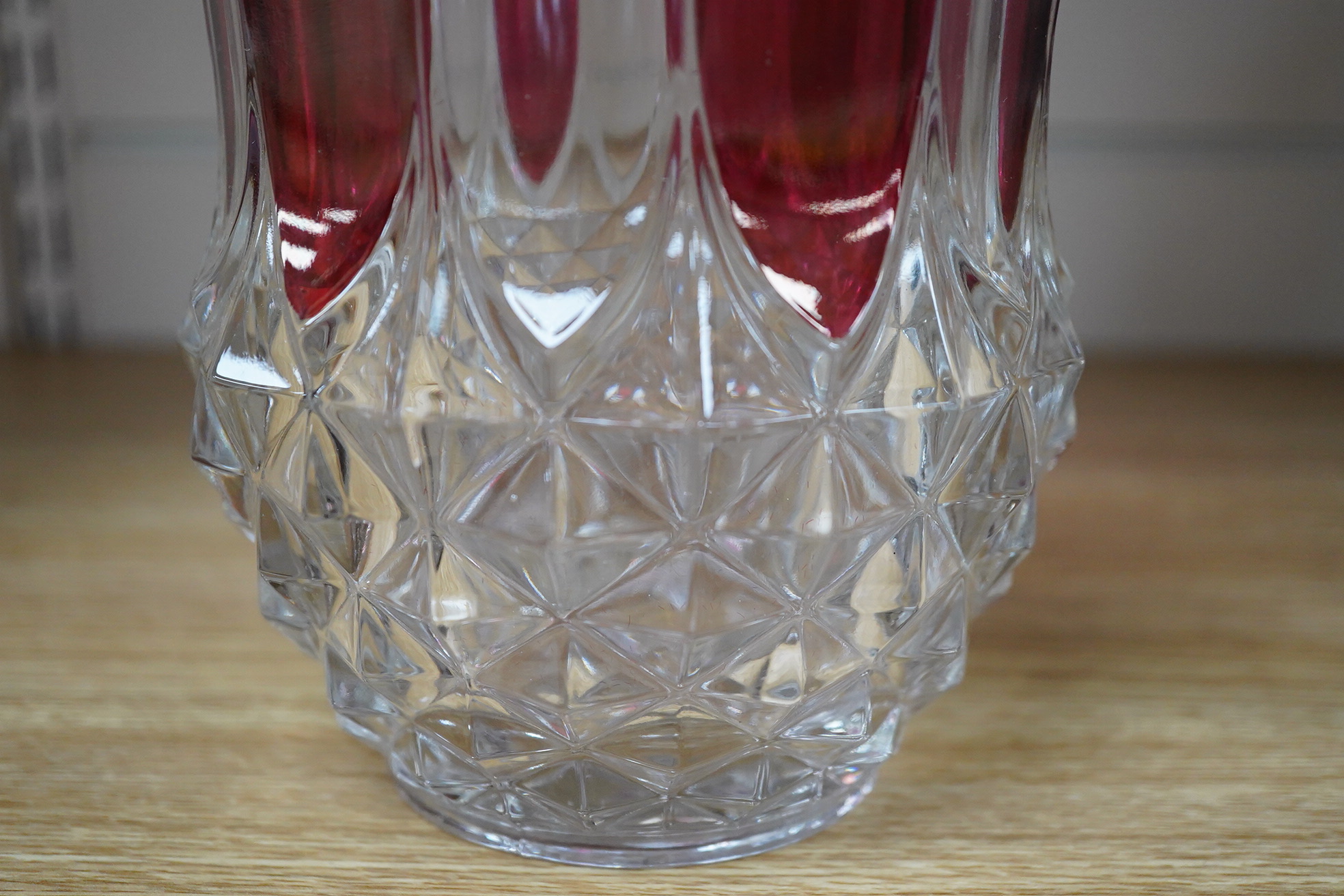 A Val Saint Lambert ruby-overlaid glass vase, 25cm high